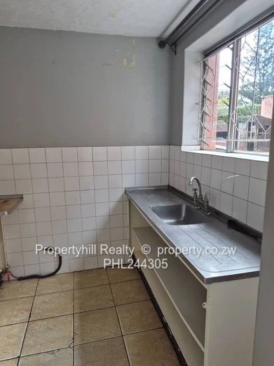 Harare CBD Avenues: 2-Bed Flat 80sqm — Borehole & Paved Yard (Sole Mandate)