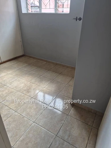 Harare CBD Avenues: 2-Bed Flat 80sqm — Borehole & Paved Yard (Sole Mandate)